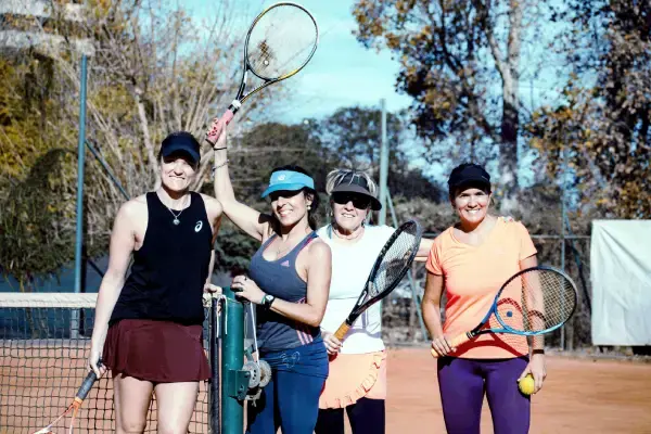 Active mature women playing tennis in Warrandyte, illustrating the social confidence and physical autonomy supported by professional menopausal pelvic wellness management at Monty Pelvic Physio.